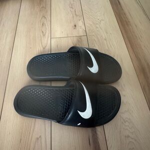 Nike Black Slides with White Swoosh Logo